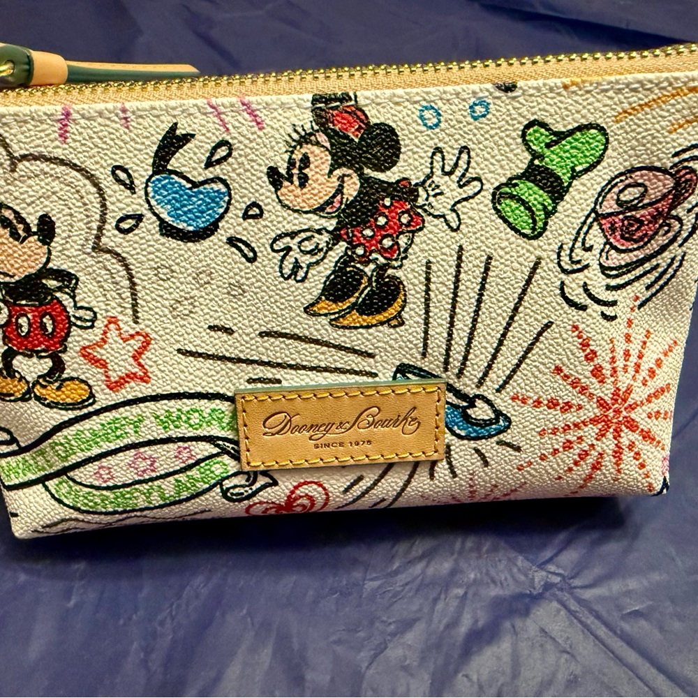Disney cosmetic case by Dooney and Bourke
